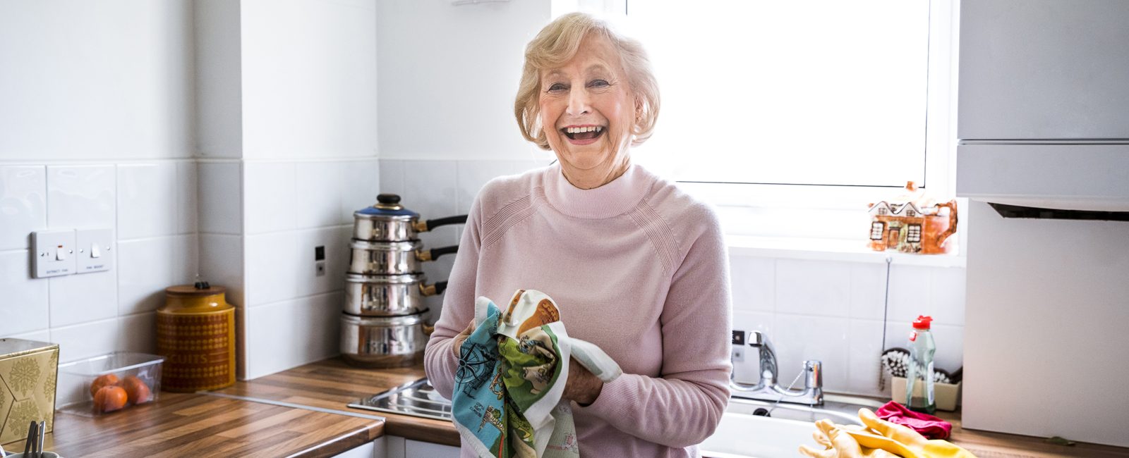 Stock older woman in kitchen