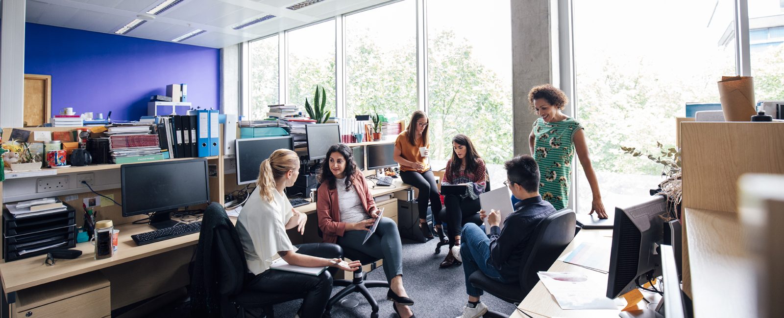 Stock people working in office