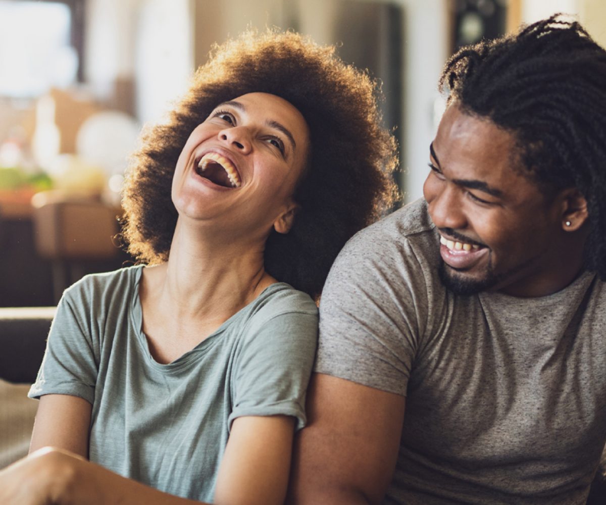 Stock young couple laughing
