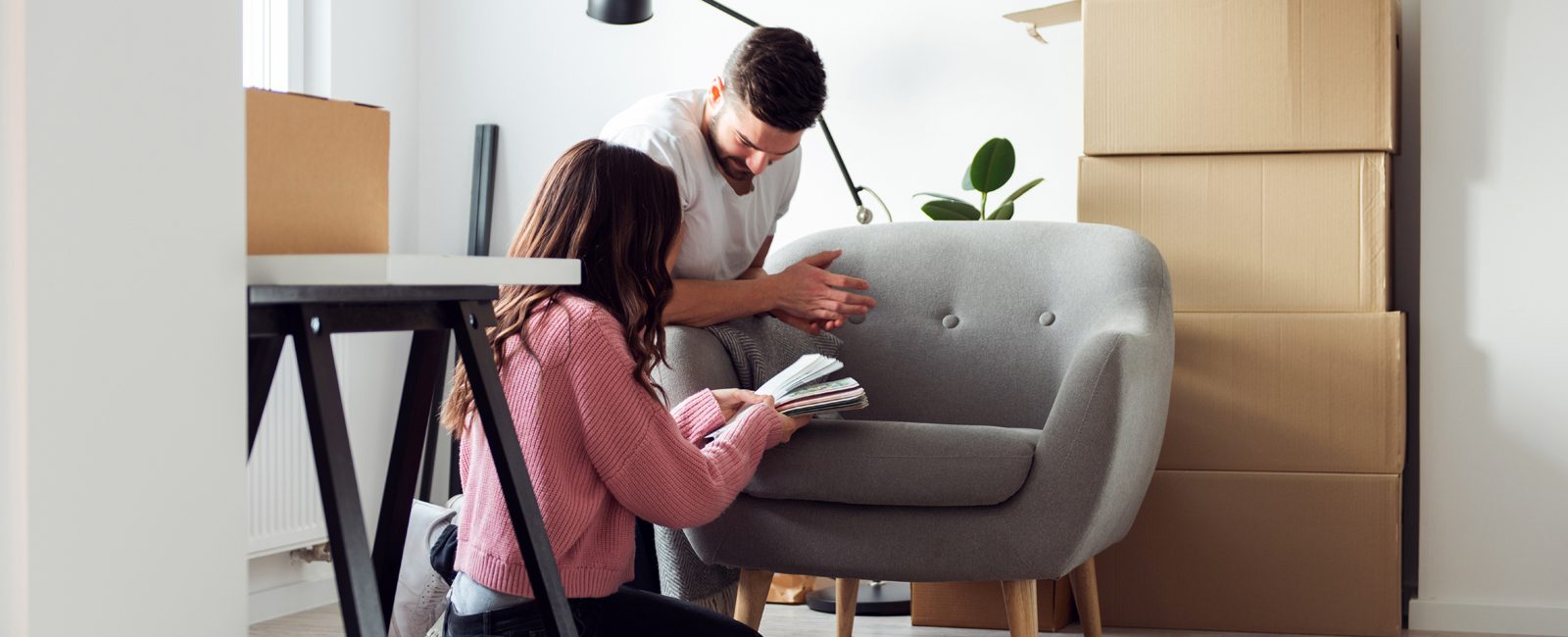 Stock young couple new home
